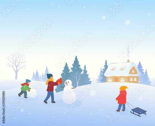 Snow covered winter village with kids making a snowman
