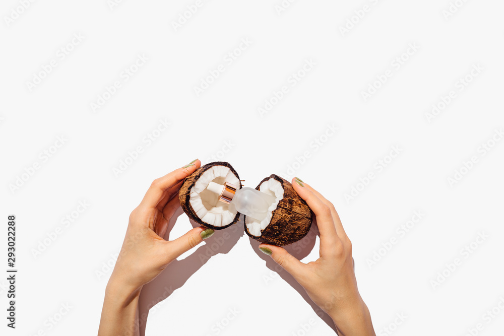 Top view female hands holding bottle Top view female hands holding bottle