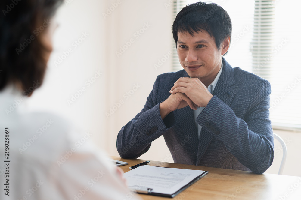job interview concept. Businessman asking candidate applicant in interview room. job interview concept. Businessman asking candidate applicant in interview room.