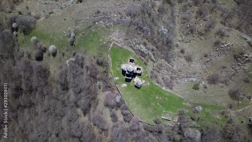 Aerial Spin: An Old Church in the Mountains of a National Park in Dombai - Dombay, Russia Aerial Spin: An Old Church in the Mountains of a National Park in Dombai - Dombay, Russia