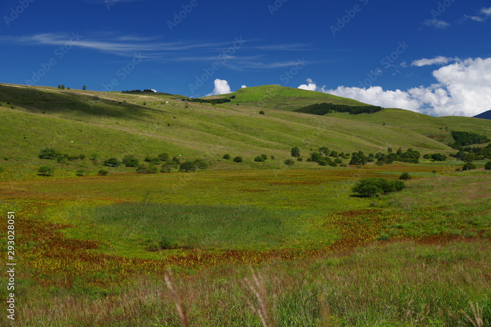 Highland wetlands and green hills