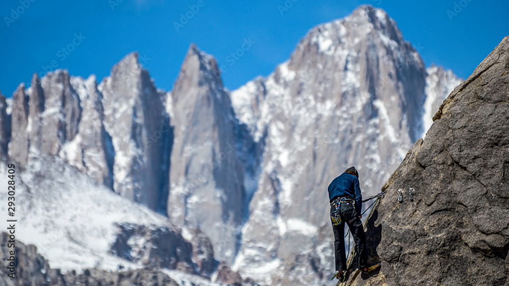 Rock Climber in front of mount Whitney