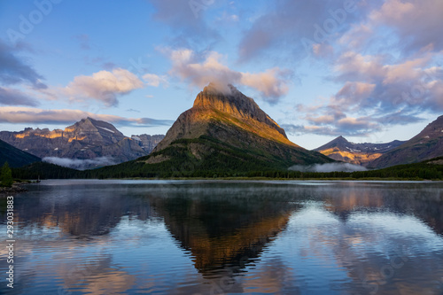 Sunrise of the Mount Wilbur, Swiftcurrent Lake in the Many Glacier area of the famous Glacier National Park © Kit Leong