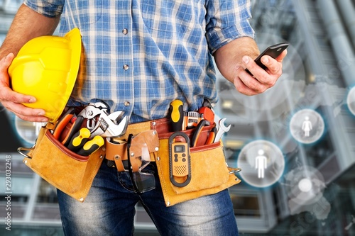 Worker man with helmet on background photo