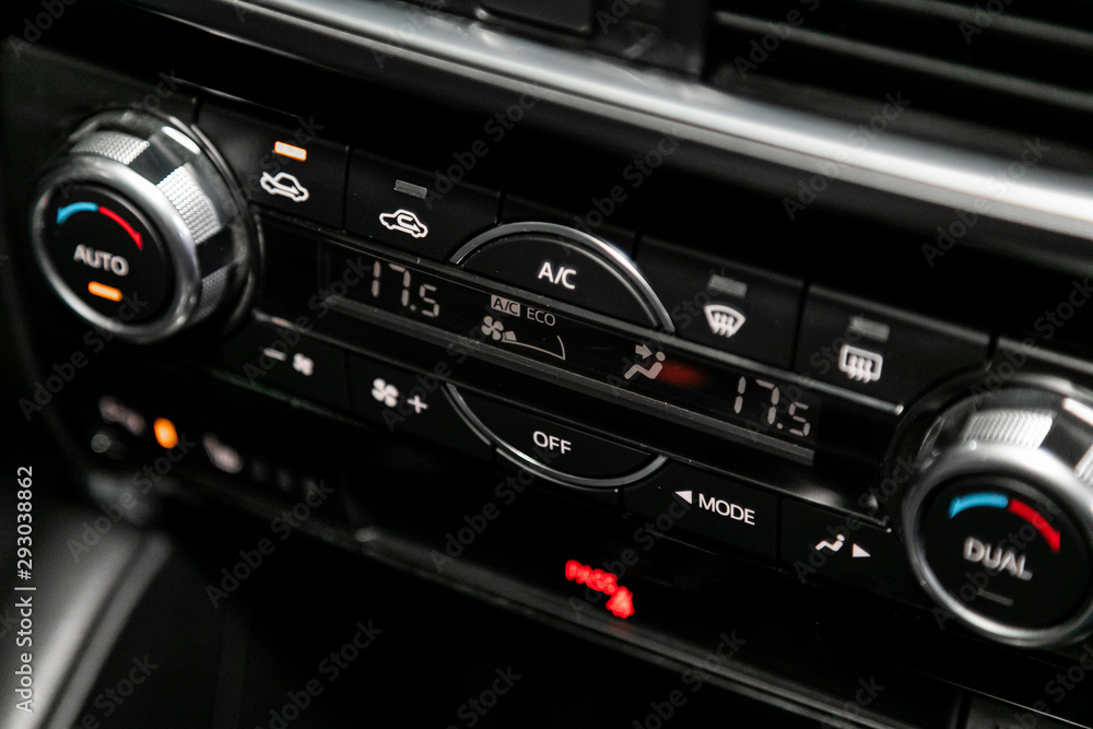Car, vehicle interior with visible climate controls, adjustment of the fragment of instrument panel.. Car, vehicle interior with visible climate controls, adjustment of the fragment of instrument panel..