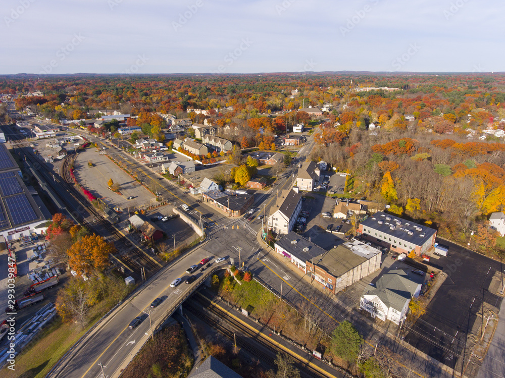 Fototapeta premium Aerial view of Wilmington historic town center at Main Street and Church Street with fall foliage, Wilmington, Massachusetts, USA.