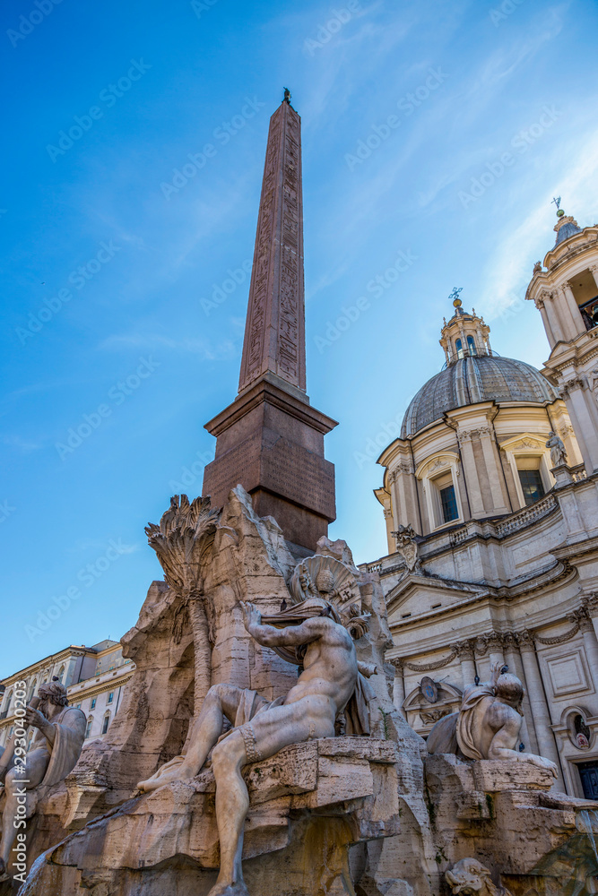 Rome, Italy - August 16, 2019: Fountain of the Four Rivers in Piazza Navona in the center of Rome