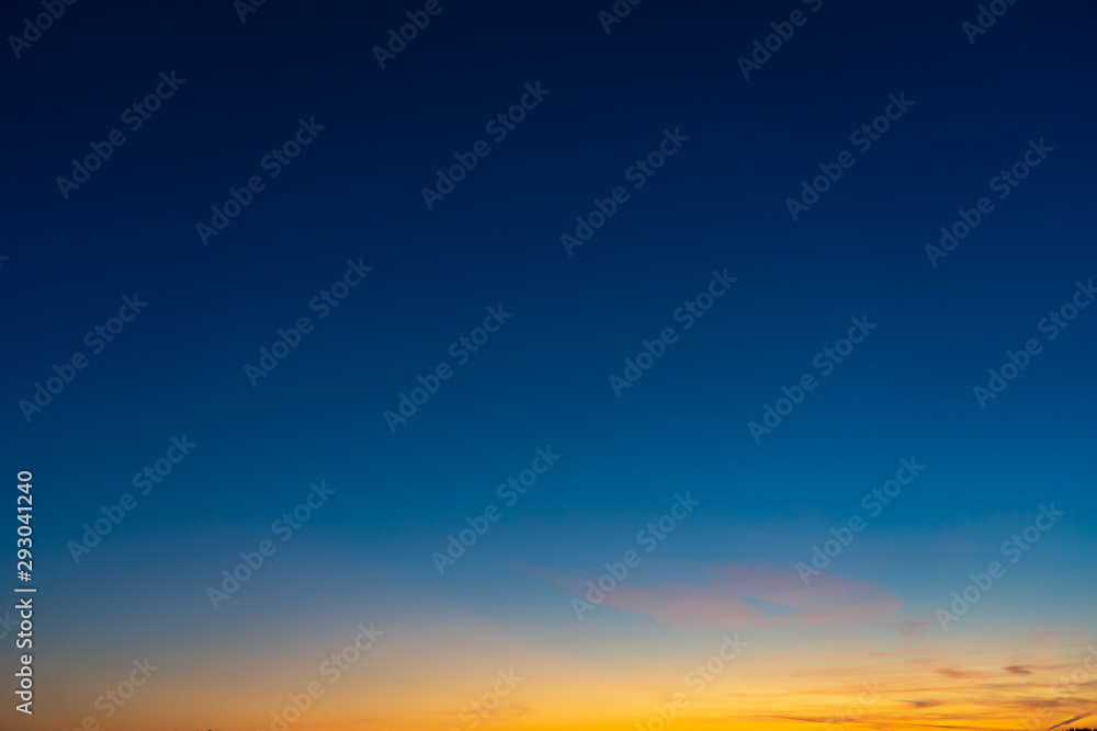 Colorful clear sky with no clouds at dusk after sunset.