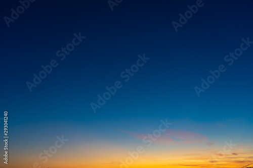 Colorful clear sky with no clouds at dusk after sunset.
