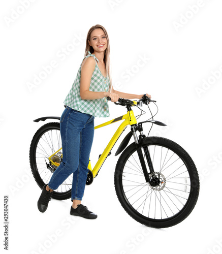 Happy young woman with bicycle on white background © New Africa