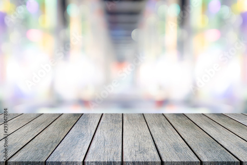 Perspective empty wooden table on top over blur background, can be used mock up for montage products display or design layout.