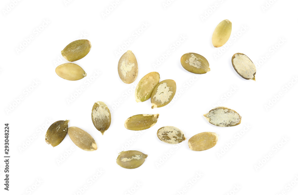 Raw peeled pumpkin seeds on white background, top view Raw peeled pumpkin seeds on white background, top view