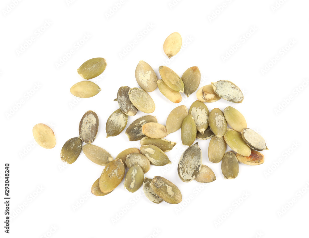 Raw peeled pumpkin seeds on white background, top view Raw peeled pumpkin seeds on white background, top view