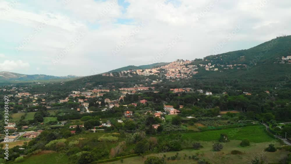 AERIAL TRUCK RIGHT: Drone flying parallel to Rocca di Papa in the Roman province, Italy with a stunning view of the small remote village on top the hills AERIAL TRUCK RIGHT: Drone flying parallel to Rocca di Papa in the Roman province, Italy with a stunning view of the small remote village on top the hills
