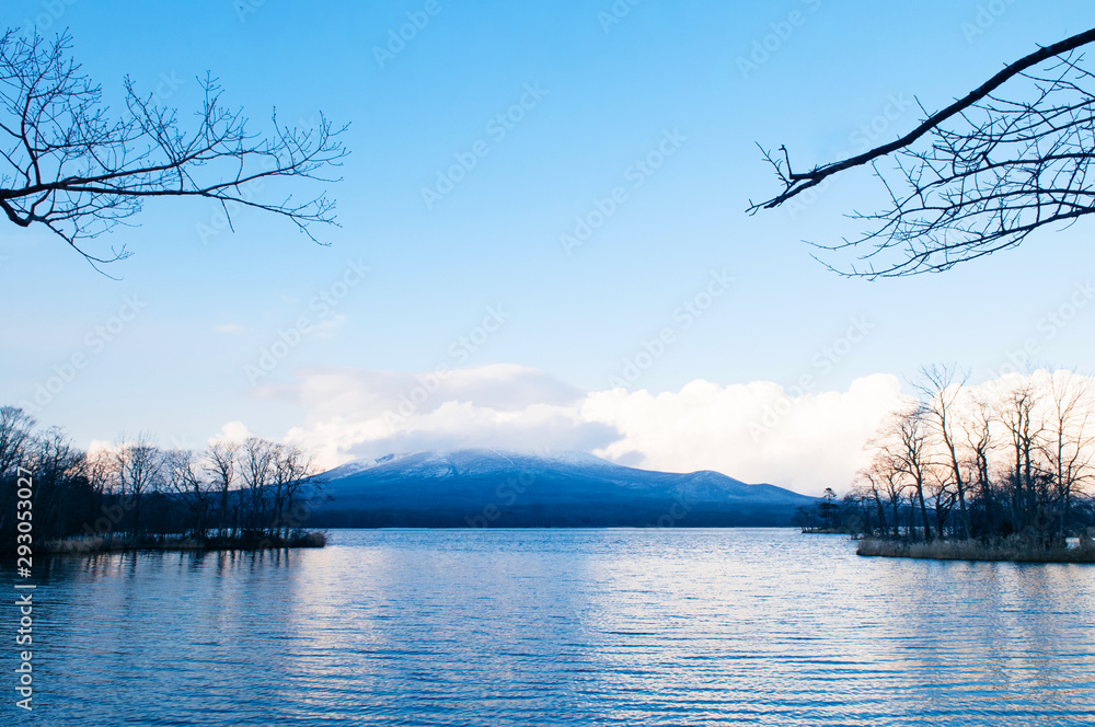Onuma Koen Quasi -National park lake in peaceful cold winter with mountain view. Hakodate, Hokkaido - Japan Onuma Koen Quasi -National park lake in peaceful cold winter with mountain view. Hakodate, Hokkaido - Japan