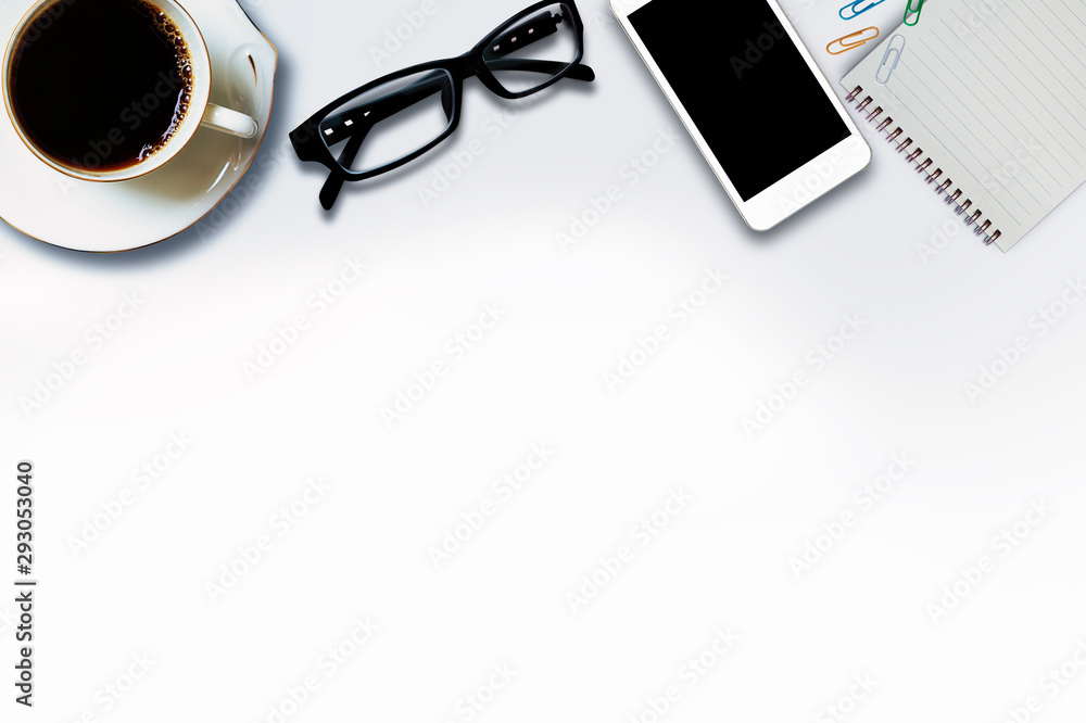 flat lay business notebook and mobile, glasses on white background flat lay business notebook and mobile, glasses on white background