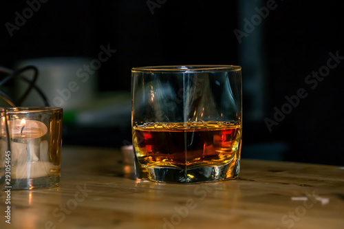 Fototapeta Naklejka Na Ścianę i Meble -  Bartender Serve Whiskey, on wood bar, 