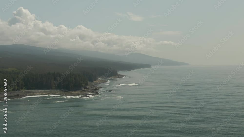 Beautiful Aerial Landscape View of the Rocky Pacific Ocean Coast in the Southern Vancouver Island during a sunny summer day. Taken between Victorial and Port Renfrew, BC, Canada. Beautiful Aerial Landscape View of the Rocky Pacific Ocean Coast in the Southern Vancouver Island during a sunny summer day. Taken between Victorial and Port Renfrew, BC, Canada.