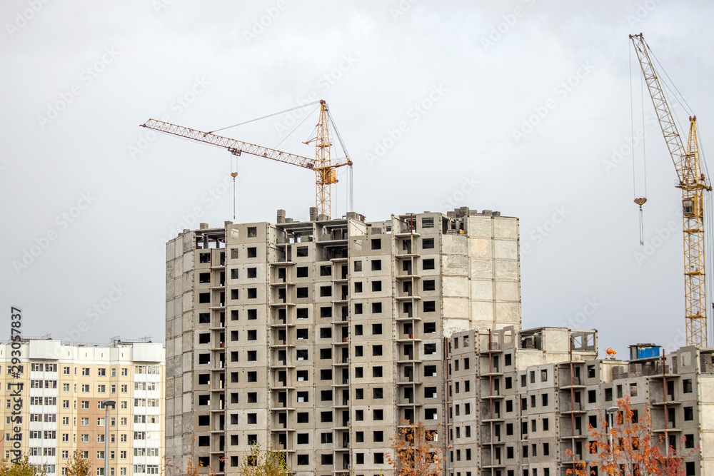 The construction of a tall frame building.