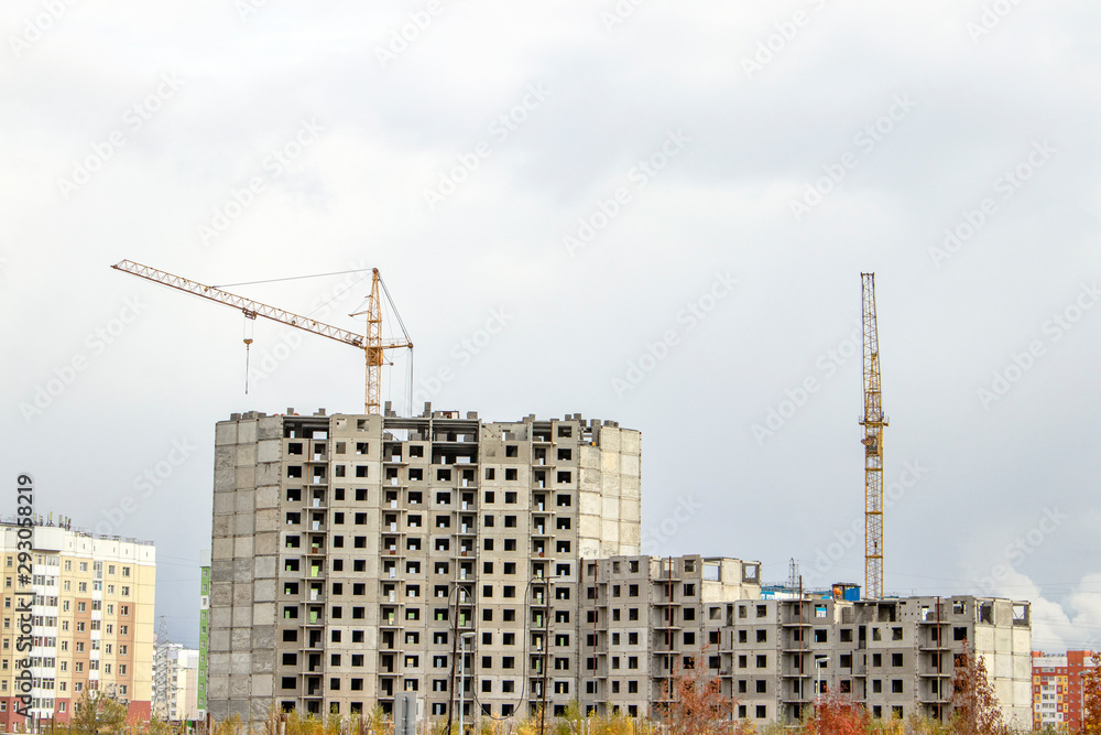 The construction of a tall frame building. The construction of a tall frame building.