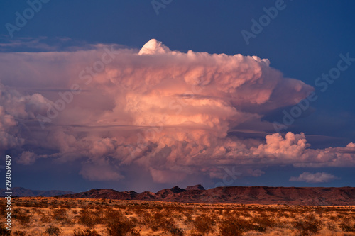 Supercell thunderstorm cumulonimbus cloud at sunset