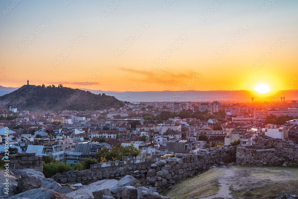 Panoramic view from Nebet tepe Hill in Plovdiv city, Bulgaria with warm autumn sunset. Ancient Plovdiv is UNESCO's World Heritage.