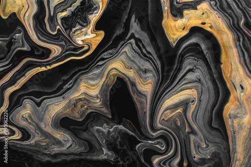 Billede på lærred Black marble background with golden waves and curls