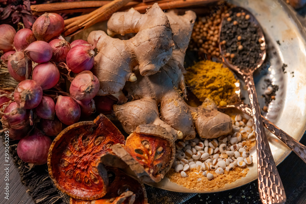 Herbs and spices on a wooden table for cooking food condiments cuisine ingredients content and healthy beautiful spa concept Herbs and spices on a wooden table for cooking food condiments cuisine ingredients content and healthy beautiful spa concept