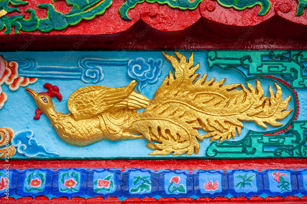 FengHuang chinese phoenix bas-relief in a taoist temple in QingChengShan, Sichuan province, China