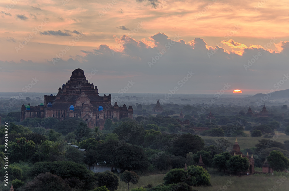 Dawn over the ancient Pagan city, Myanmar. The view from the top of Shwesandaw Temple.  View of Dhammayangyi Temple.