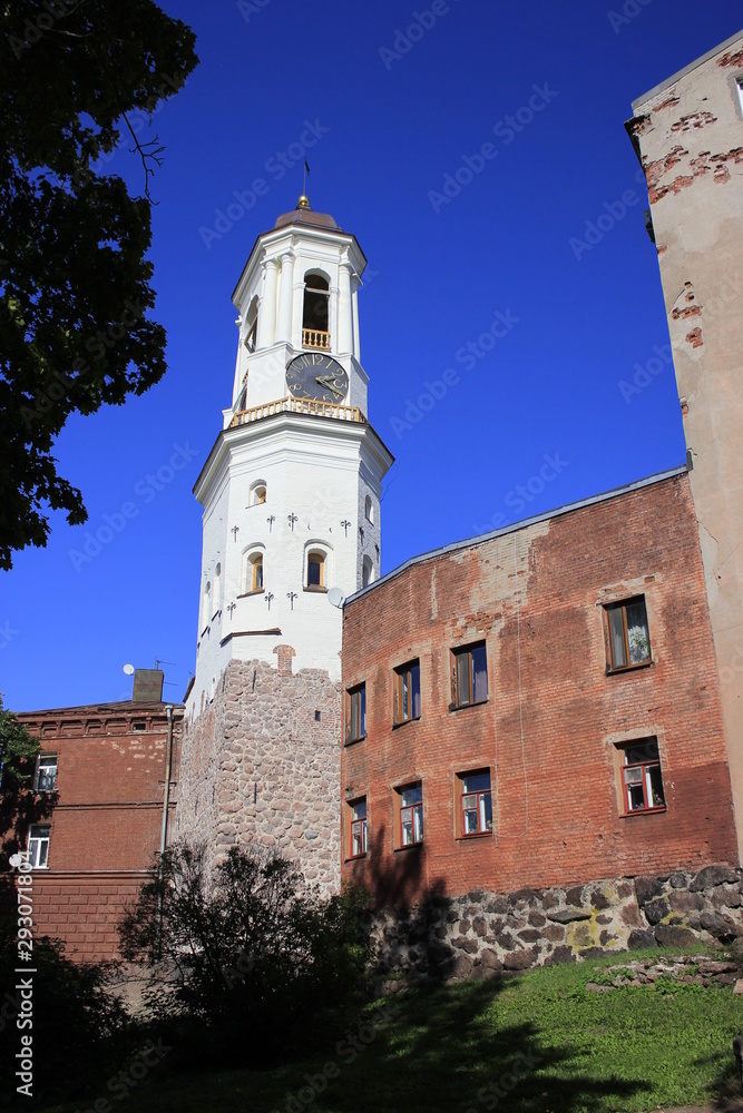 Fototapeta premium White tower with clock