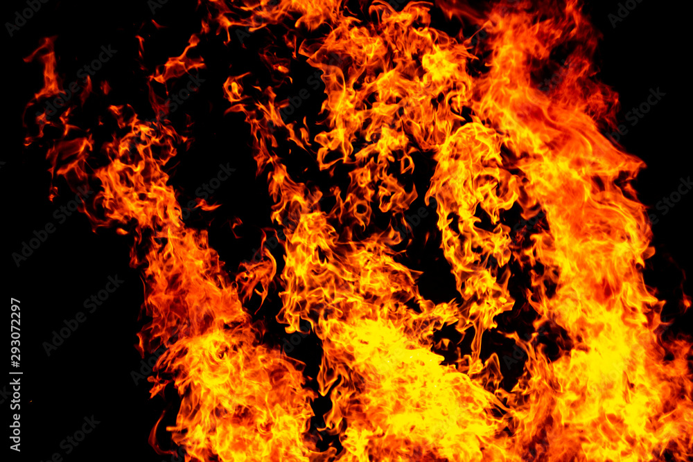 Big fire and silhouette of brazier on black background. Flame of fire in dark. Bonfire in barbecue at night. Dance of flame. Form of blaze Big fire and silhouette of brazier on black background. Flame of fire in dark. Bonfire in barbecue at night. Dance of flame. Form of blaze