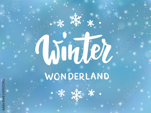 Winter wonderland text, hand drawn brush lettering. Holiday greetings quote. Blue background with falling snow effect.