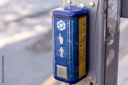 Vászonkép Traffic light control button with crosswalk scheme for blind people