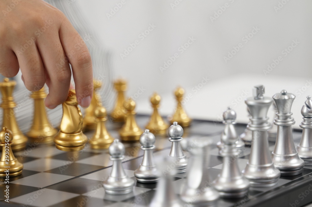 Business play with chess game. success management concept of business strategy and tactic challenge