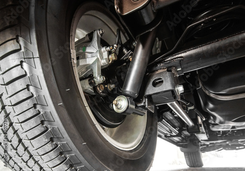 Fototapet Closeup of a rear suspension of a truck