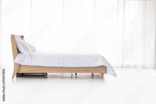 Comfortable sleeping bed Relaxing in the bedroom Backdrop of white room curtains