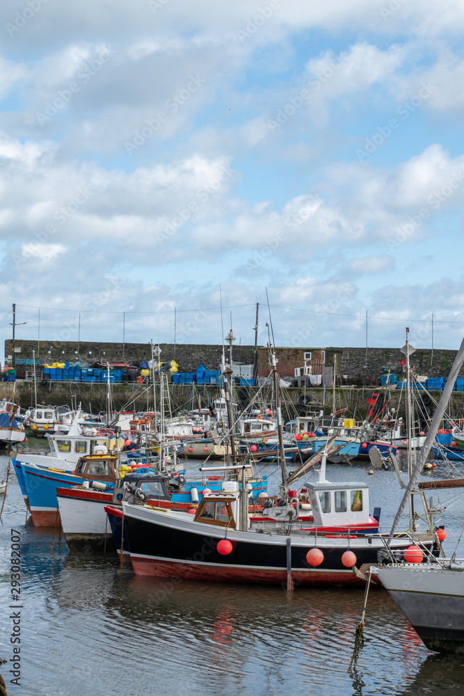 Fishing boats moored in a Cornish harbour