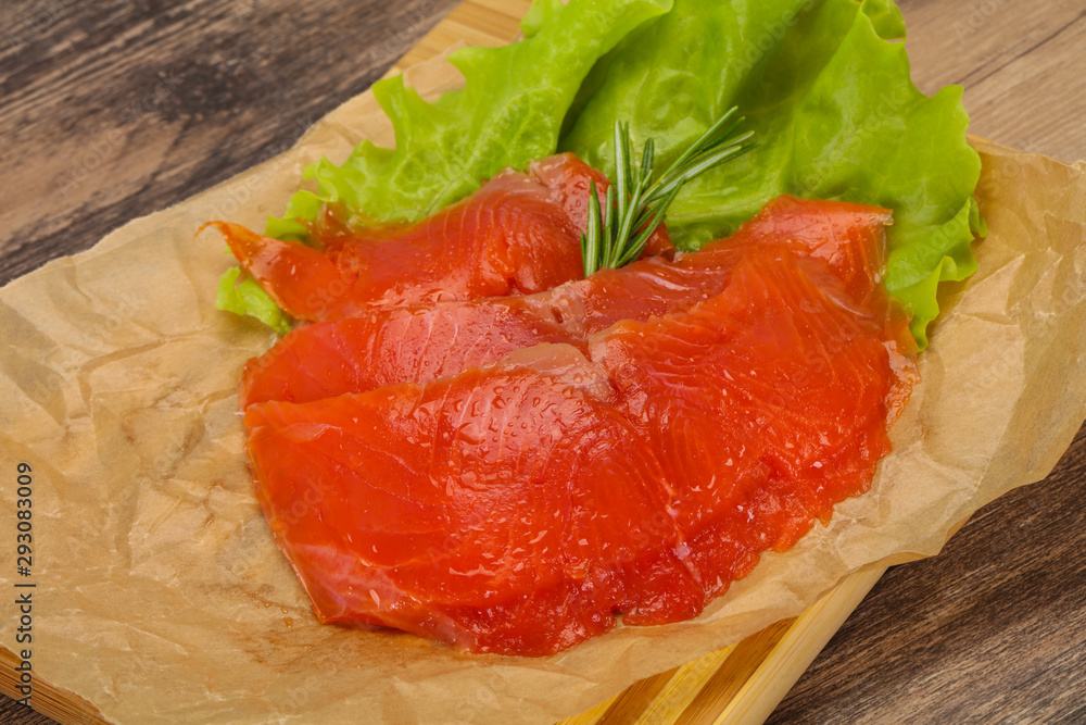 Sliced salmon fillet served rosemary Sliced salmon fillet served rosemary