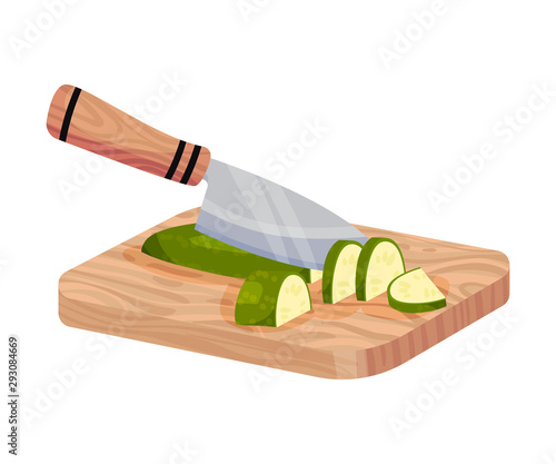 Green Zucchini Sliced With Knife On Cutting Board Isolated On White Background