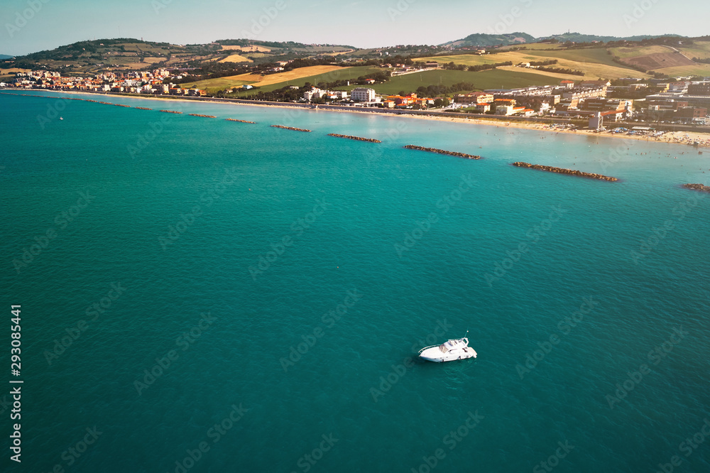Aerial view of speed boat in sea, Ancona, Italy. Speed boat at sea, view from above
