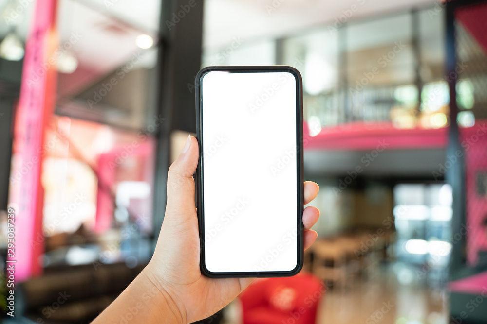 Women's hands holding cell telephone watching social media in a smart phone. social network concept with smart phone Women's hands holding cell telephone watching social media in a smart phone. social network concept with smart phone