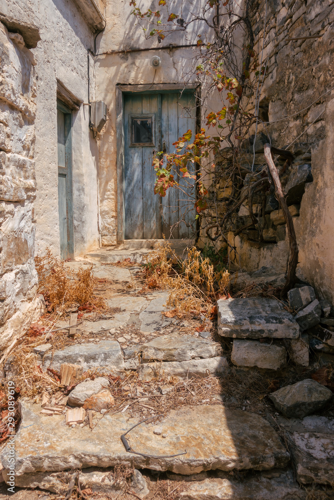 Entrance to a Greek house with a traditional blue door