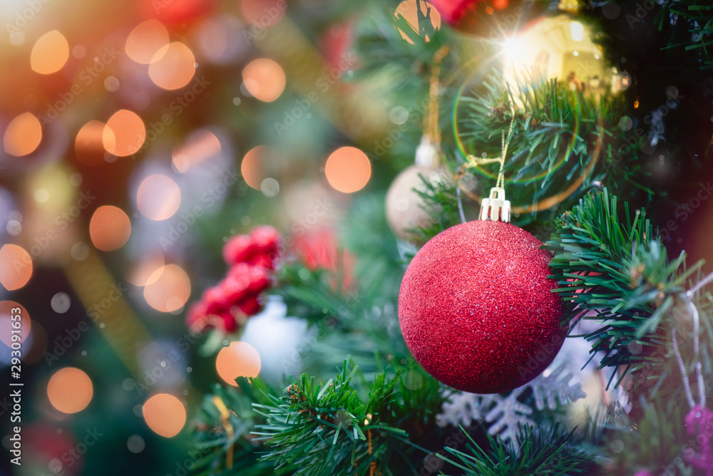 Christmas tree with decorations bokeh blurred glow. Happy New Year and Merry x-mas. Christmas tree with decorations bokeh blurred glow. Happy New Year and Merry x-mas.