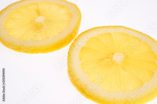 slice of lemon isolated on white background