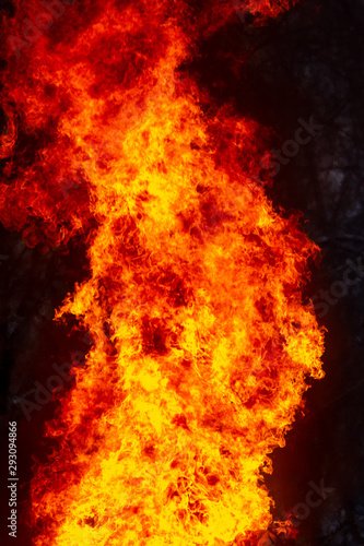 Flame of fire from a burning house as an abstract background