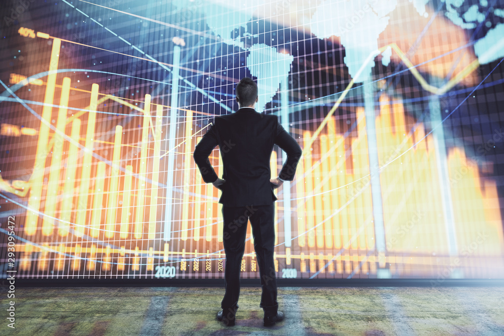 Businessman and forex graph and world map hologram. Double exposure. Concept of financial education and analysis Businessman and forex graph and world map hologram. Double exposure. Concept of financial education and analysis