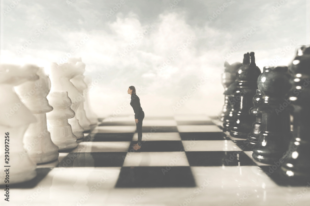 surreal photo of a black woman who challenges her white rival in the chessboard surreal photo of a black woman who challenges her white rival in the chessboard
