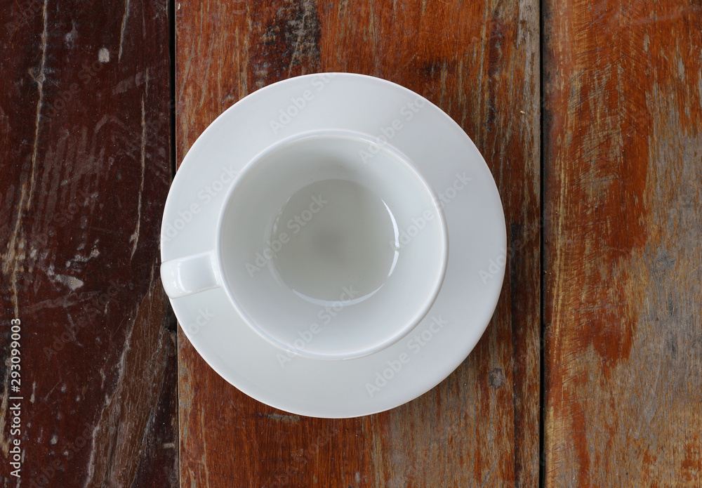 Empty coffee cup placed on wood Empty coffee cup placed on wood