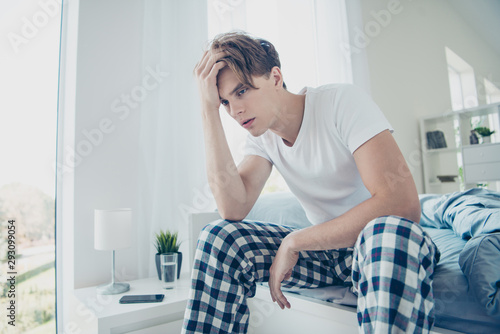 Cuadro en lienzo Portrait of unhappy unwell man after hangover party suffer terrible migraine hav